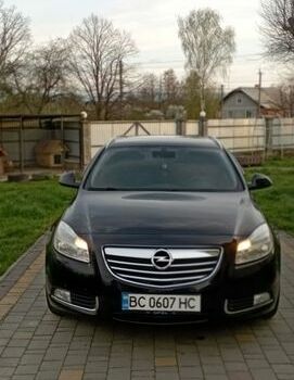 Чорний Опель Інсігнія, об'ємом двигуна 1.96 л та пробігом 250 тис. км за 6500 $, фото 1 на Automoto.ua