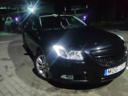 Черный Опель Инсигния, объемом двигателя 2 л и пробегом 328 тыс. км за 3200 $, фото 1 на Automoto.ua