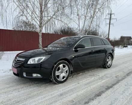 Чорний Опель Інсігнія, об'ємом двигуна 1.6 л та пробігом 204 тис. км за 8400 $, фото 1 на Automoto.ua