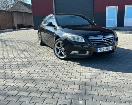 Чорний Опель Інсігнія, об'ємом двигуна 2 л та пробігом 270 тис. км за 6699 $, фото 1 на Automoto.ua