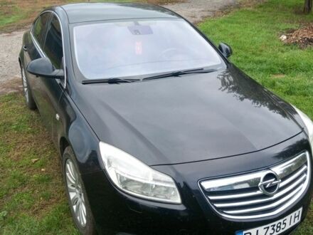 Черный Опель Инсигния, объемом двигателя 2 л и пробегом 190 тыс. км за 7200 $, фото 1 на Automoto.ua