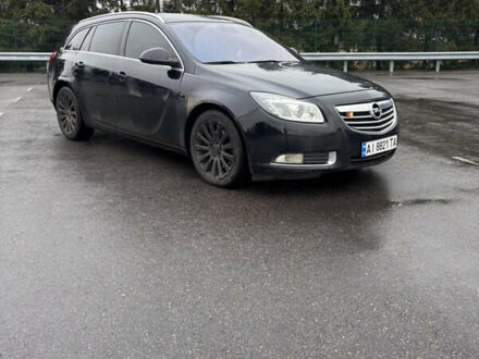 Черный Опель Инсигния, объемом двигателя 2 л и пробегом 265 тыс. км за 7250 $, фото 1 на Automoto.ua