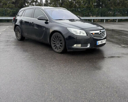 Черный Опель Инсигния, объемом двигателя 2 л и пробегом 265 тыс. км за 7250 $, фото 1 на Automoto.ua
