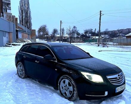 Черный Опель Инсигния, объемом двигателя 2 л и пробегом 199 тыс. км за 7500 $, фото 1 на Automoto.ua