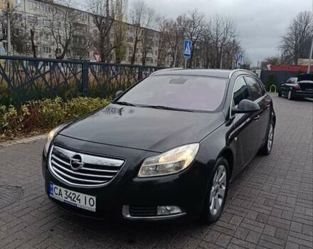 Черный Опель Инсигния, объемом двигателя 1.96 л и пробегом 177 тыс. км за 6500 $, фото 1 на Automoto.ua