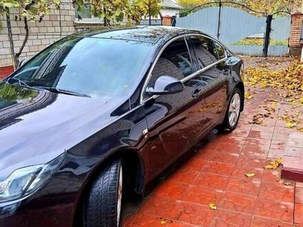 Чорний Опель Інсігнія, об'ємом двигуна 1.6 л та пробігом 247 тис. км за 7700 $, фото 1 на Automoto.ua