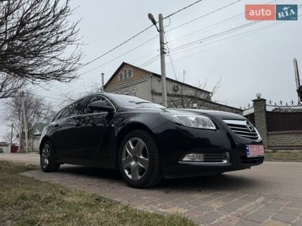 Чорний Опель Інсігнія, об'ємом двигуна 1.6 л та пробігом 204 тис. км за 7900 $, фото 1 на Automoto.ua