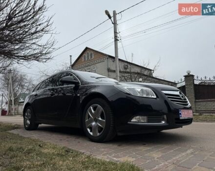 Чорний Опель Інсігнія, об'ємом двигуна 1.6 л та пробігом 204 тис. км за 7900 $, фото 1 на Automoto.ua
