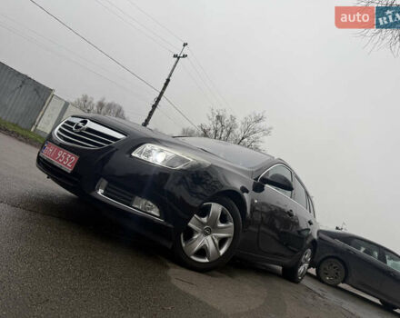 Черный Опель Инсигния, объемом двигателя 1.6 л и пробегом 204 тыс. км за 8000 $, фото 1 на Automoto.ua