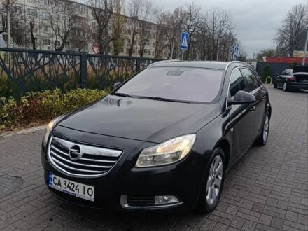 Чорний Опель Інсігнія, об'ємом двигуна 2 л та пробігом 175 тис. км за 6700 $, фото 1 на Automoto.ua