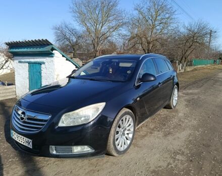 Чорний Опель Інсігнія, об'ємом двигуна 2 л та пробігом 248 тис. км за 7700 $, фото 1 на Automoto.ua