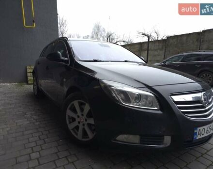 Чорний Опель Інсігнія, об'ємом двигуна 1.96 л та пробігом 412 тис. км за 6950 $, фото 1 на Automoto.ua