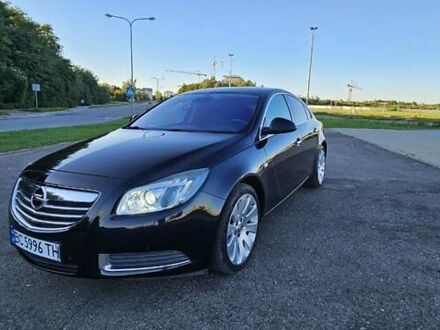 Черный Опель Инсигния, объемом двигателя 2 л и пробегом 182 тыс. км за 7800 $, фото 1 на Automoto.ua