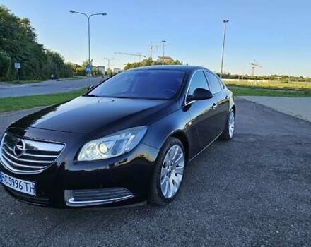 Черный Опель Инсигния, объемом двигателя 2 л и пробегом 182 тыс. км за 7800 $, фото 1 на Automoto.ua