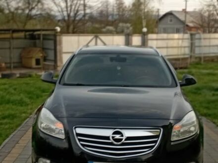 Черный Опель Инсигния, объемом двигателя 2 л и пробегом 244 тыс. км за 7700 $, фото 1 на Automoto.ua