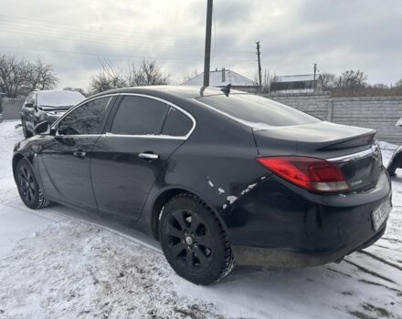 Черный Опель Инсигния, объемом двигателя 2 л и пробегом 260 тыс. км за 5700 $, фото 1 на Automoto.ua