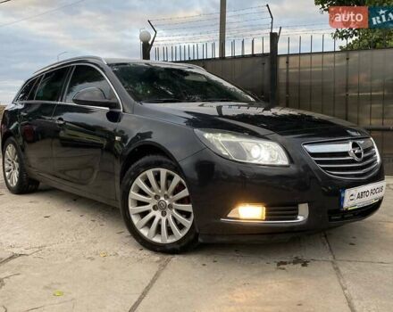 Черный Опель Инсигния, объемом двигателя 1.96 л и пробегом 304 тыс. км за 6990 $, фото 1 на Automoto.ua