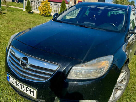 Чорний Опель Інсігнія, об'ємом двигуна 2 л та пробігом 241 тис. км за 7100 $, фото 1 на Automoto.ua