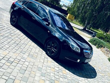 Чорний Опель Інсігнія, об'ємом двигуна 2 л та пробігом 207 тис. км за 7300 $, фото 1 на Automoto.ua