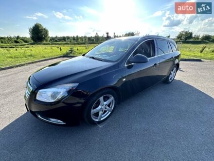 Черный Опель Инсигния, объемом двигателя 2 л и пробегом 195 тыс. км за 7700 $, фото 1 на Automoto.ua