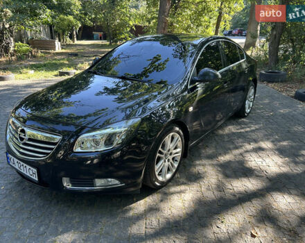 Чорний Опель Інсігнія, об'ємом двигуна 2 л та пробігом 263 тис. км за 7900 $, фото 1 на Automoto.ua