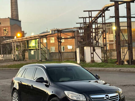 Черный Опель Инсигния, объемом двигателя 2 л и пробегом 266 тыс. км за 7600 $, фото 1 на Automoto.ua