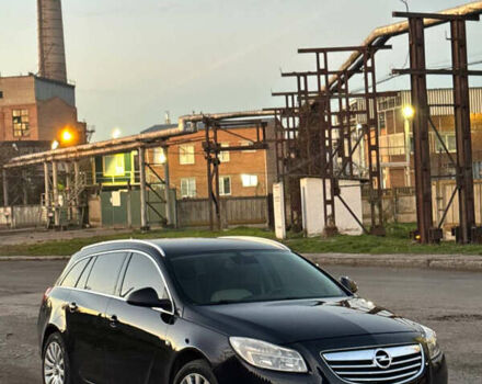 Черный Опель Инсигния, объемом двигателя 2 л и пробегом 266 тыс. км за 7600 $, фото 1 на Automoto.ua