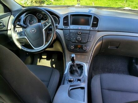 Чорний Опель Інсігнія, об'ємом двигуна 1.8 л та пробігом 205 тис. км за 5200 $, фото 1 на Automoto.ua