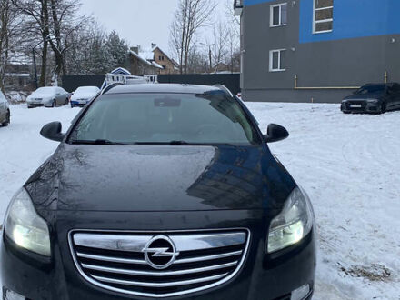 Чорний Опель Інсігнія, об'ємом двигуна 1.96 л та пробігом 324 тис. км за 6999 $, фото 1 на Automoto.ua