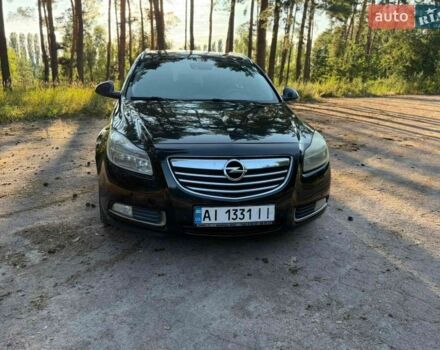 Чорний Опель Інсігнія, об'ємом двигуна 1.96 л та пробігом 325 тис. км за 7999 $, фото 1 на Automoto.ua