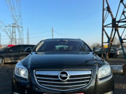 Чорний Опель Інсігнія, об'ємом двигуна 1.8 л та пробігом 242 тис. км за 6999 $, фото 1 на Automoto.ua