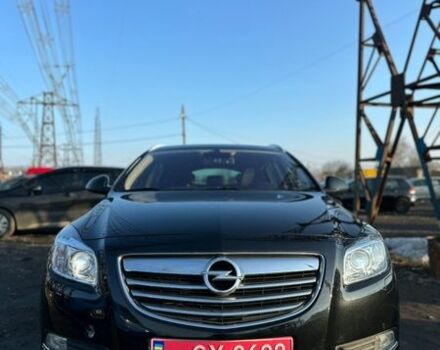 Чорний Опель Інсігнія, об'ємом двигуна 1.8 л та пробігом 242 тис. км за 6999 $, фото 1 на Automoto.ua