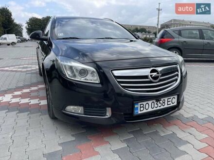 Чорний Опель Інсігнія, об'ємом двигуна 2 л та пробігом 259 тис. км за 5750 $, фото 1 на Automoto.ua