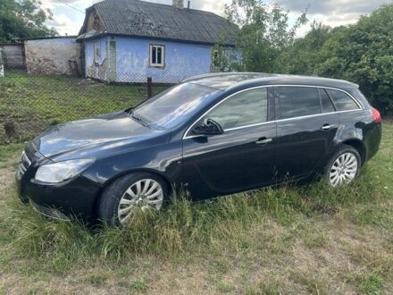 Чорний Опель Інсігнія, об'ємом двигуна 2 л та пробігом 250 тис. км за 4500 $, фото 1 на Automoto.ua