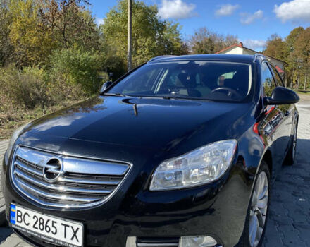 Чорний Опель Інсігнія, об'ємом двигуна 1.96 л та пробігом 231 тис. км за 7500 $, фото 1 на Automoto.ua