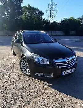 Чорний Опель Інсігнія, об'ємом двигуна 2 л та пробігом 180 тис. км за 8500 $, фото 1 на Automoto.ua