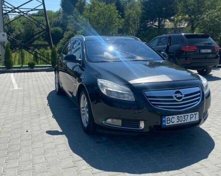 Чорний Опель Інсігнія, об'ємом двигуна 2 л та пробігом 250 тис. км за 6300 $, фото 1 на Automoto.ua