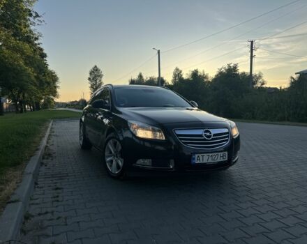 Чорний Опель Інсігнія, об'ємом двигуна 2 л та пробігом 240 тис. км за 7550 $, фото 1 на Automoto.ua