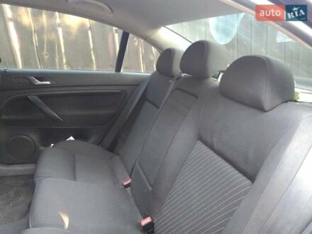 Черный Опель Инсигния, объемом двигателя 1.8 л и пробегом 220 тыс. км за 6700 $, фото 1 на Automoto.ua