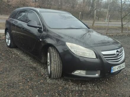 Черный Опель Инсигния, объемом двигателя 1.96 л и пробегом 324 тыс. км за 6700 $, фото 1 на Automoto.ua