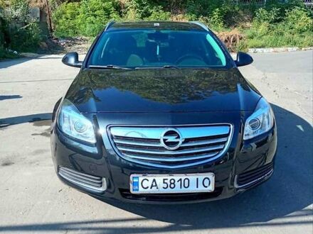 Черный Опель Инсигния, объемом двигателя 2 л и пробегом 322 тыс. км за 7500 $, фото 1 на Automoto.ua