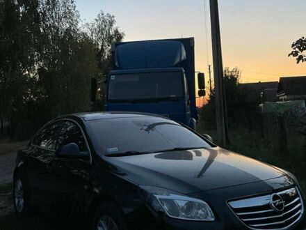 Чорний Опель Інсігнія, об'ємом двигуна 2 л та пробігом 290 тис. км за 7400 $, фото 1 на Automoto.ua