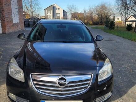Черный Опель Инсигния, объемом двигателя 1.96 л и пробегом 225 тыс. км за 7500 $, фото 1 на Automoto.ua
