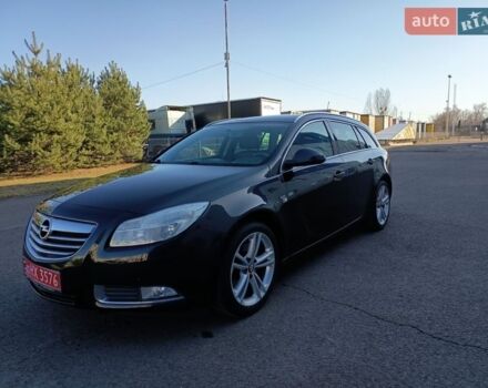 Чорний Опель Інсігнія, об'ємом двигуна 1.6 л та пробігом 198 тис. км за 6850 $, фото 1 на Automoto.ua