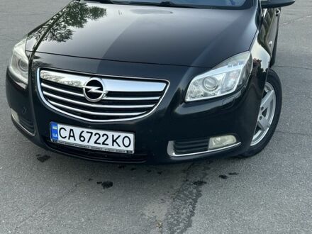 Черный Опель Инсигния, объемом двигателя 2 л и пробегом 395 тыс. км за 7300 $, фото 1 на Automoto.ua