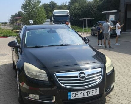 Чорний Опель Інсігнія, об'ємом двигуна 2 л та пробігом 3 тис. км за 6516 $, фото 1 на Automoto.ua