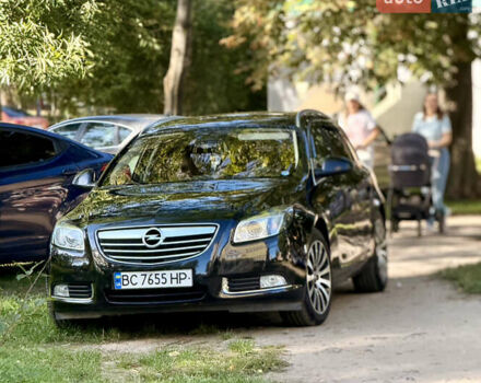 Чорний Опель Інсігнія, об'ємом двигуна 1.96 л та пробігом 210 тис. км за 7800 $, фото 1 на Automoto.ua