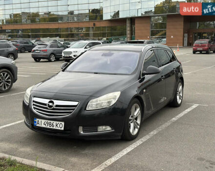 Чорний Опель Інсігнія, об'ємом двигуна 1.96 л та пробігом 324 тис. км за 6900 $, фото 1 на Automoto.ua