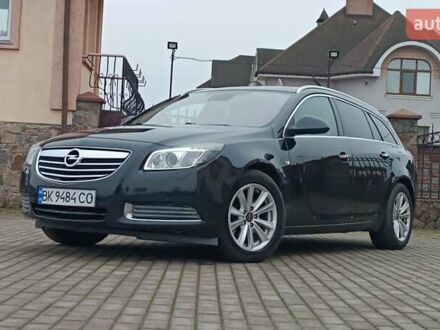 Черный Опель Инсигния, объемом двигателя 2 л и пробегом 215 тыс. км за 7250 $, фото 1 на Automoto.ua
