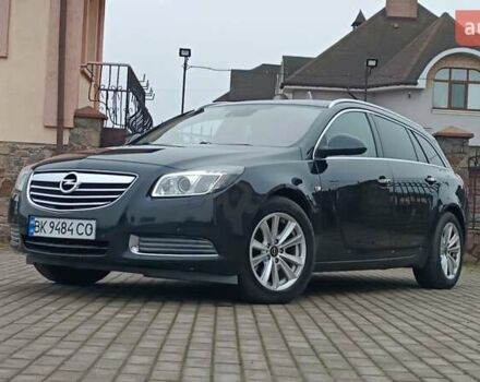Черный Опель Инсигния, объемом двигателя 2 л и пробегом 215 тыс. км за 7250 $, фото 1 на Automoto.ua